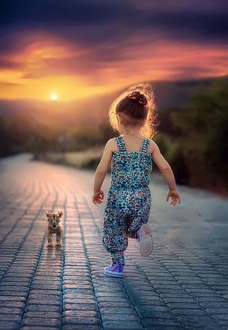 Girl running in the sunrise